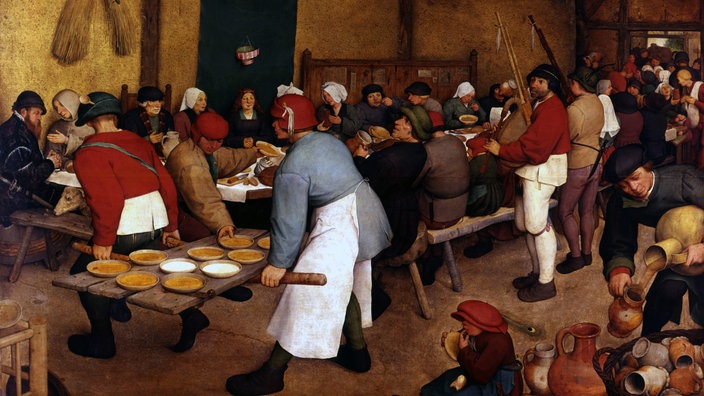 Ölgemälde von Pieter Brueghel: Essen bei einer mittelalterlichen Hochzeit.